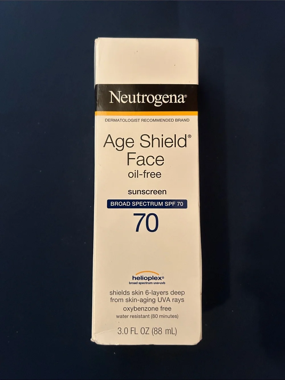 Neutrogena Age Shield Face Oil-Free Sunscreen SPF 70 - White, Black, Blue
